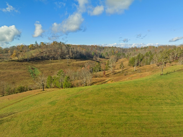 exterior space with a rural view