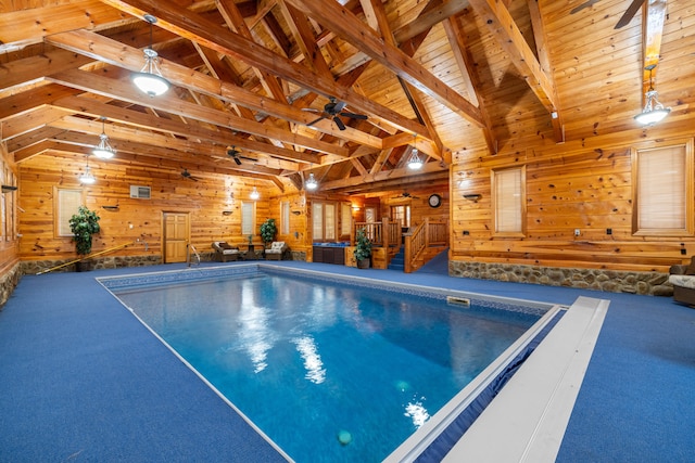 view of pool with a jacuzzi