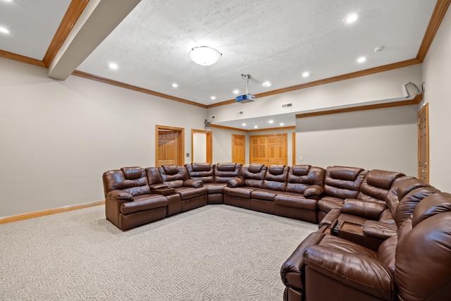 carpeted cinema room with crown molding and a textured ceiling