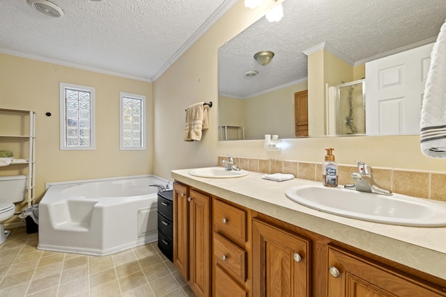 full bathroom featuring a textured ceiling, toilet, and ornamental molding