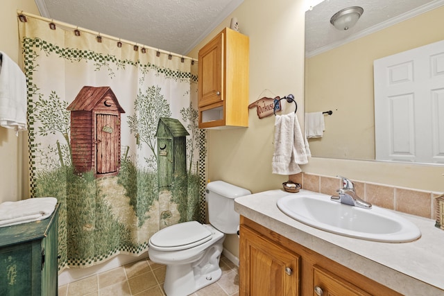 bathroom featuring tile patterned floors, ornamental molding, vanity, a textured ceiling, and toilet