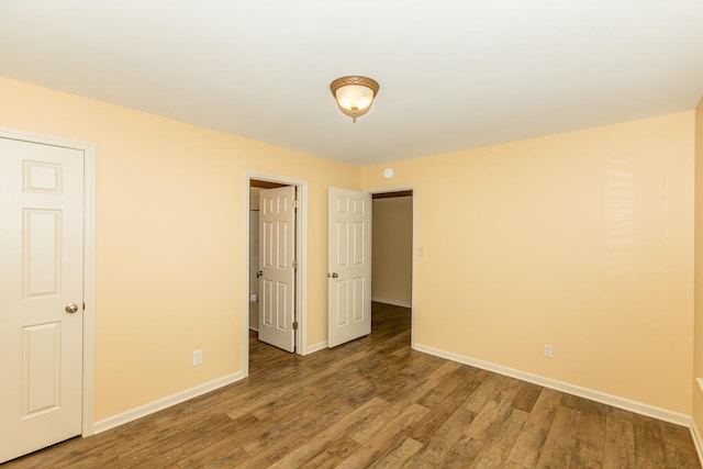 empty room featuring hardwood / wood-style floors