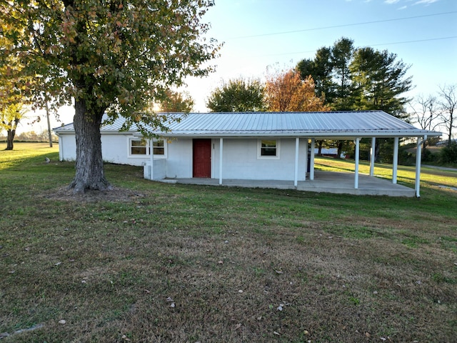 exterior space featuring a front lawn