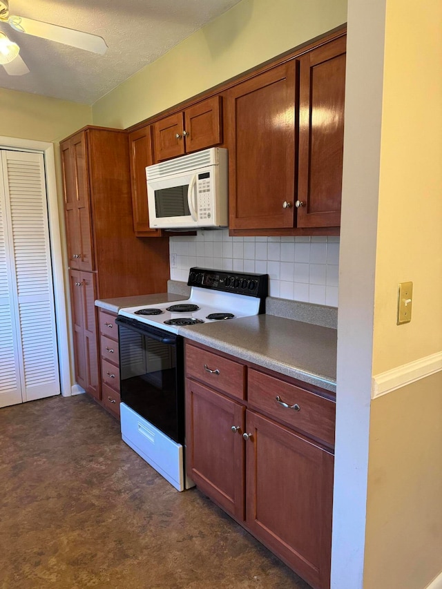 kitchen featuring white appliances, tasteful backsplash, and ceiling fan