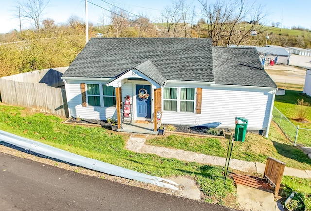 ranch-style home with a front lawn