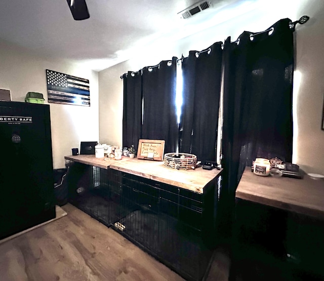 bathroom featuring hardwood / wood-style flooring