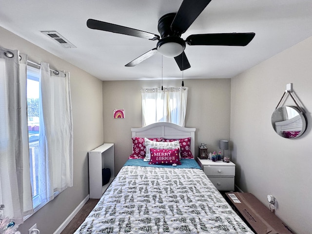 bedroom featuring ceiling fan and wood-type flooring