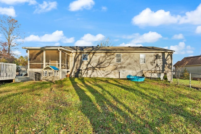 view of yard featuring a sunroom