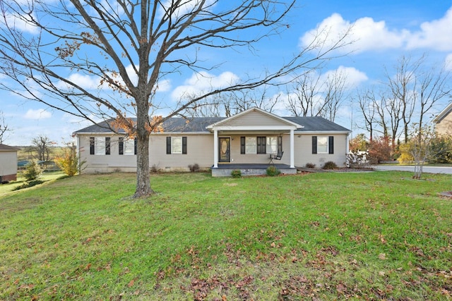 ranch-style house featuring a front lawn and a porch