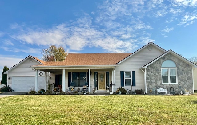 ranch-style home featuring a porch, a garage, and a front lawn