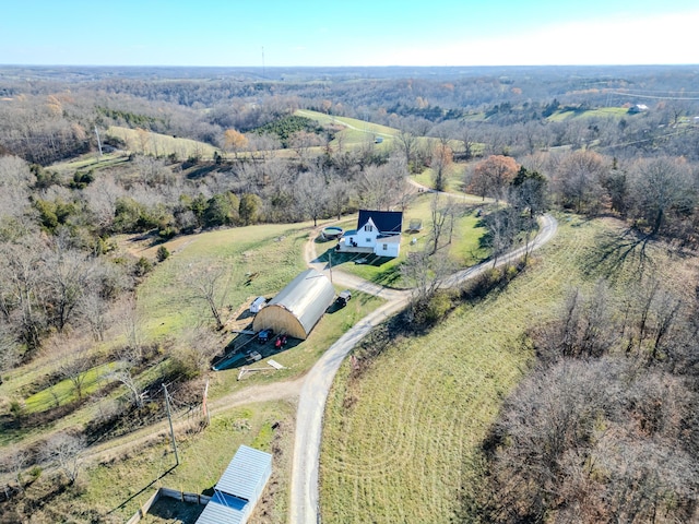 birds eye view of property featuring a rural view