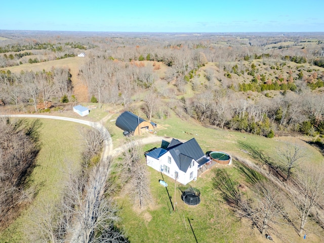 birds eye view of property featuring a rural view