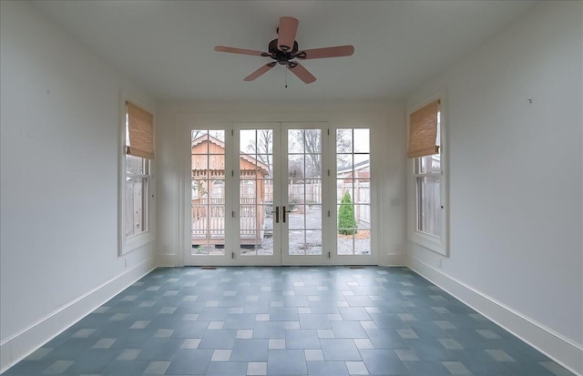 doorway to outside with ceiling fan, french doors, and a healthy amount of sunlight