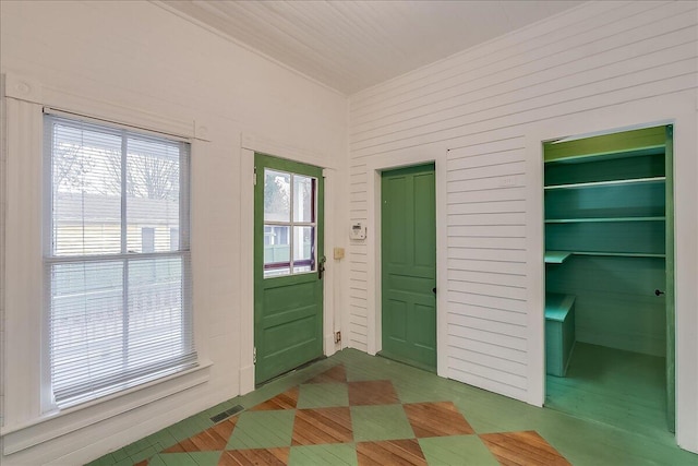 foyer featuring hardwood / wood-style floors