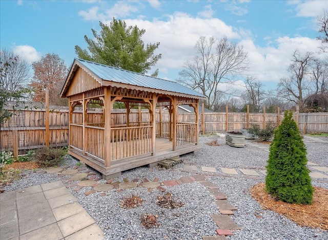 view of patio / terrace featuring an outdoor fire pit