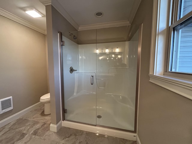 bathroom with an enclosed shower, toilet, and crown molding