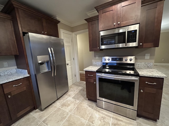 kitchen featuring light stone counters, dark brown cabinets, appliances with stainless steel finishes, and crown molding