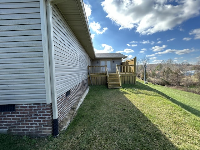 view of yard with a deck