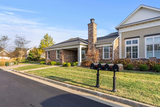 view of front of house with a front lawn