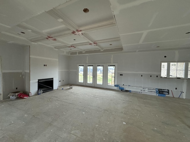 unfurnished living room with a wealth of natural light