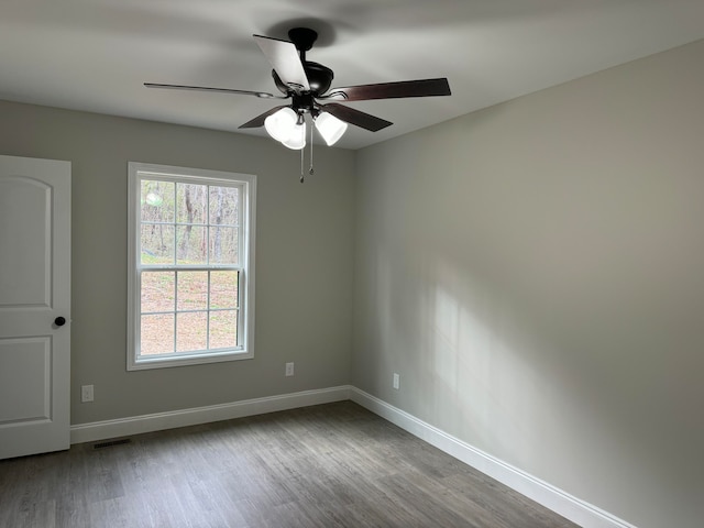 unfurnished room featuring ceiling fan and light hardwood / wood-style flooring