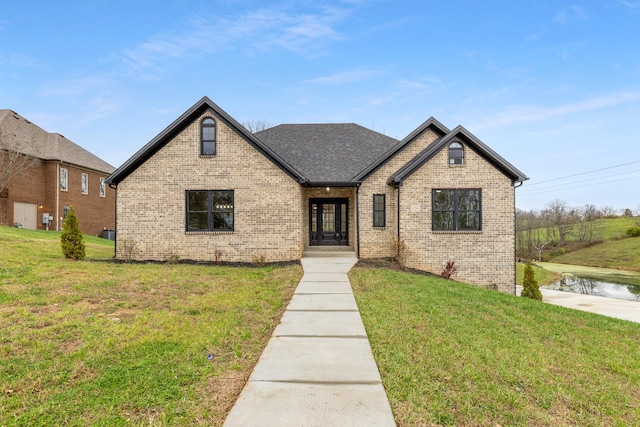 view of front of property with a front yard