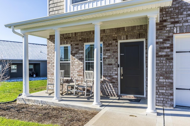 entrance to property with covered porch