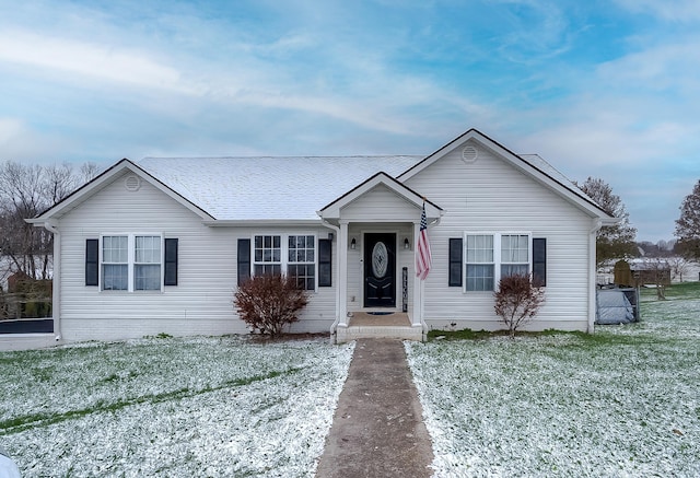 single story home featuring a yard