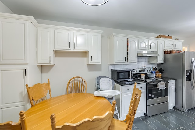 kitchen with stainless steel appliances, white cabinetry, and tasteful backsplash