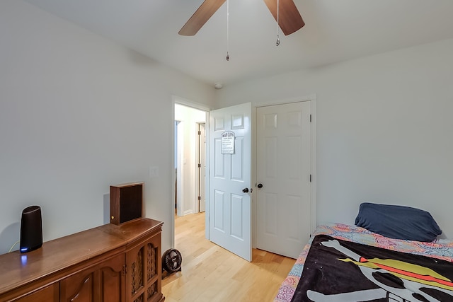 bedroom featuring ceiling fan and light wood-type flooring