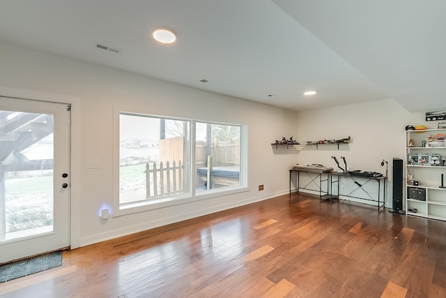 interior space with hardwood / wood-style floors