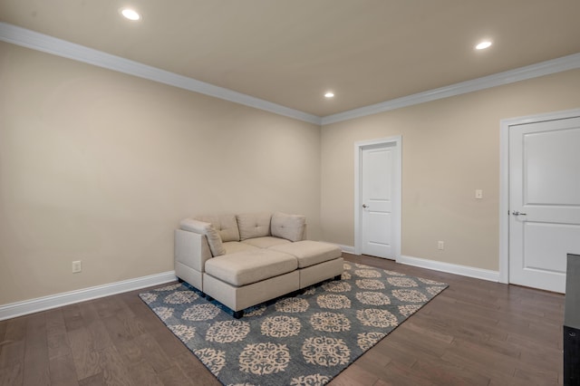 living room featuring crown molding and dark hardwood / wood-style flooring