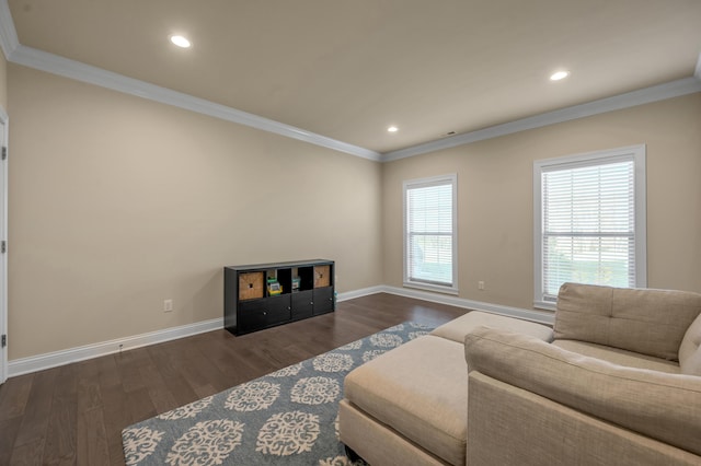 living room with dark hardwood / wood-style flooring and ornamental molding