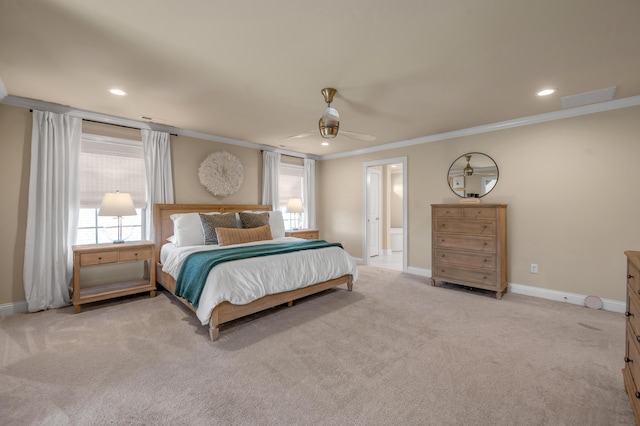 carpeted bedroom with ceiling fan and crown molding