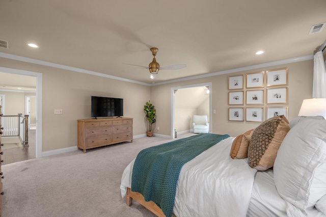 bedroom with ceiling fan, light colored carpet, and crown molding