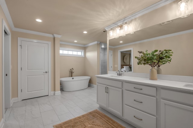 bathroom featuring vanity, a tub to relax in, and crown molding