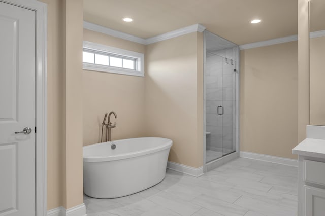 bathroom with separate shower and tub, crown molding, and vanity