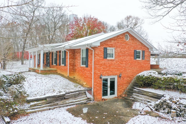 view of snow covered property