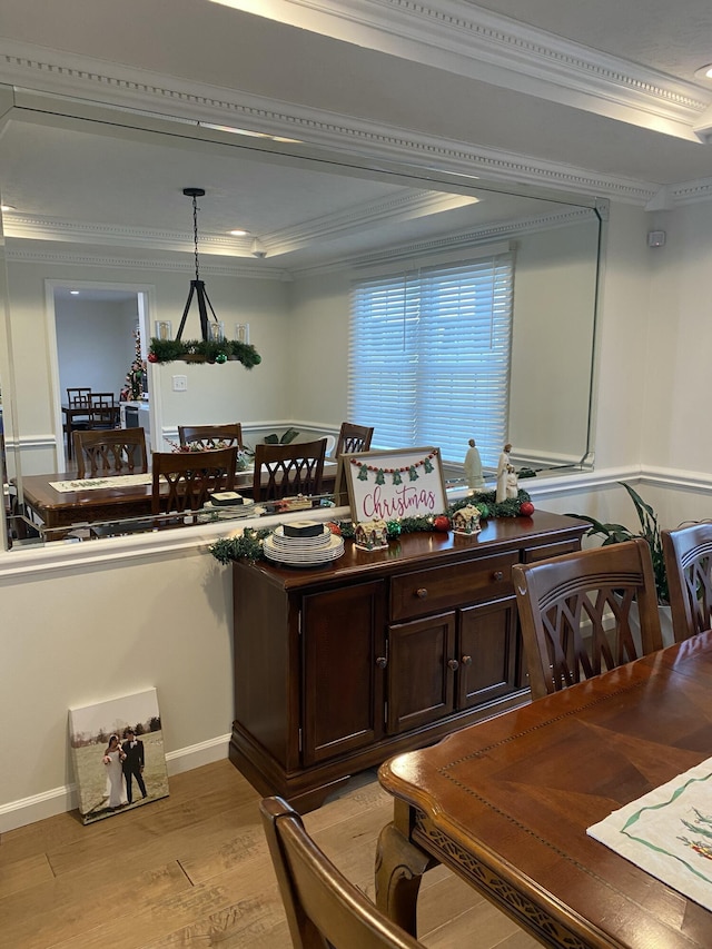 interior space with light hardwood / wood-style floors and crown molding