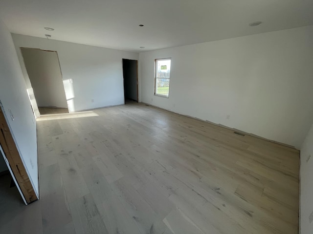 empty room featuring light hardwood / wood-style floors