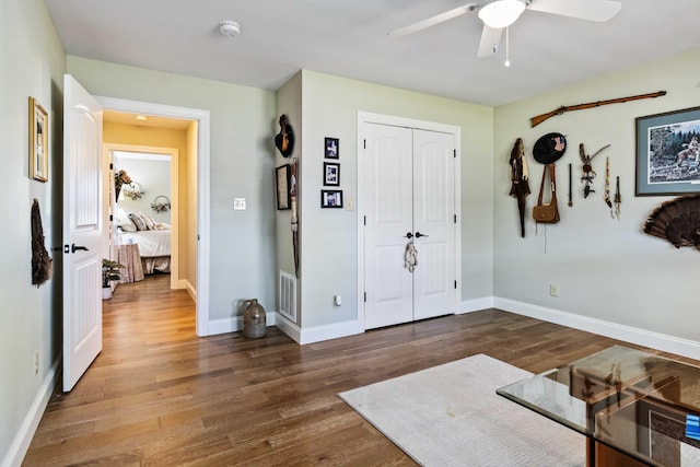 entrance foyer with dark hardwood / wood-style floors and ceiling fan