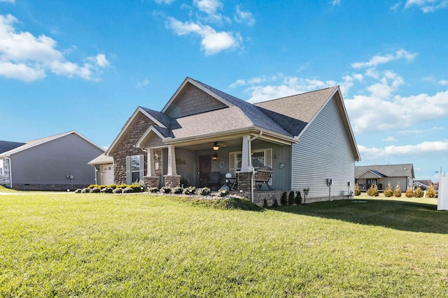 craftsman-style house with a front lawn and a porch