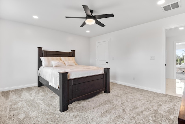 carpeted bedroom with ceiling fan