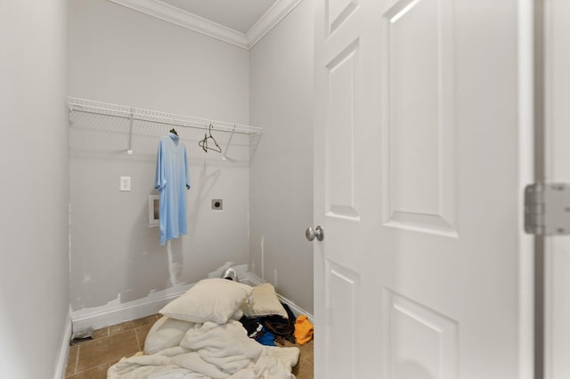 washroom featuring hookup for an electric dryer, light tile patterned floors, crown molding, and washer hookup