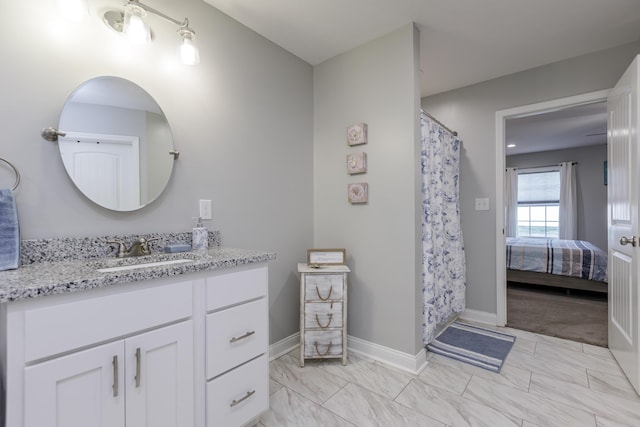 bathroom with vanity and walk in shower