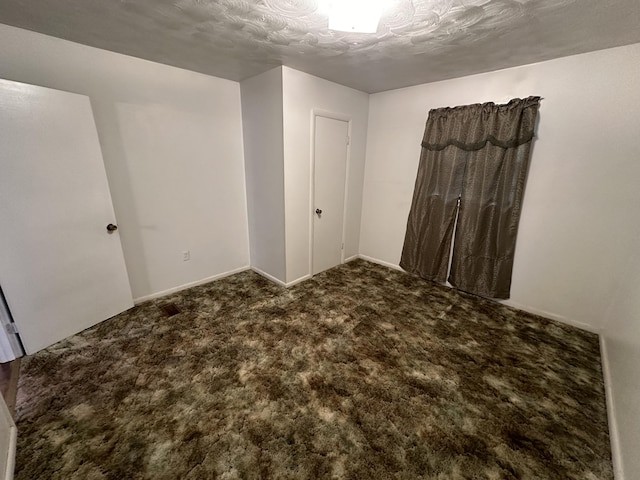 unfurnished bedroom featuring carpet flooring