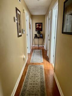 hall featuring hardwood / wood-style flooring