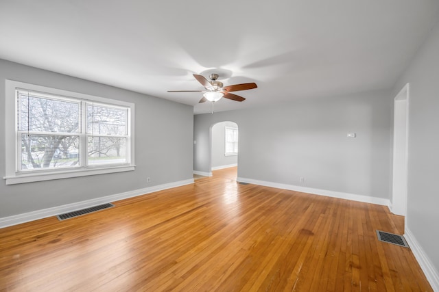 spare room featuring ceiling fan and light hardwood / wood-style floors