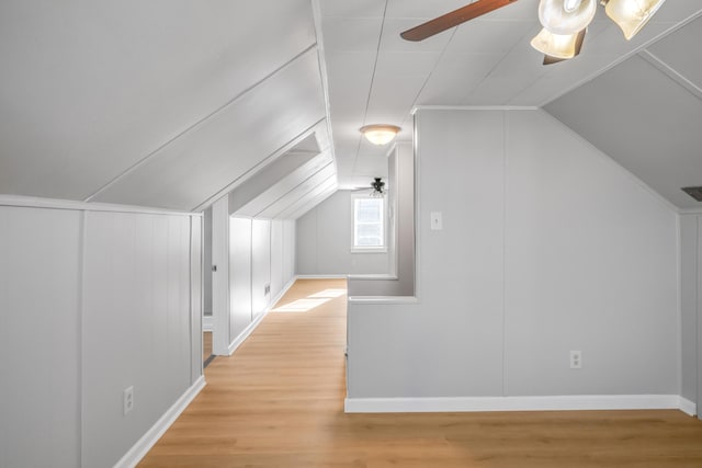 bonus room with hardwood / wood-style flooring, ceiling fan, and lofted ceiling