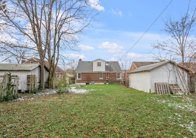 view of yard with a storage shed